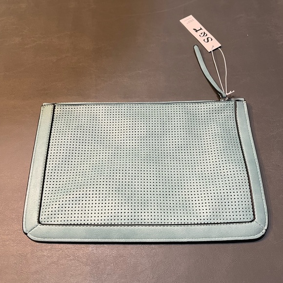 This handbag/makeup bag is a cute turquoise blueish color brand is summer & rose - Picture 2 of 5